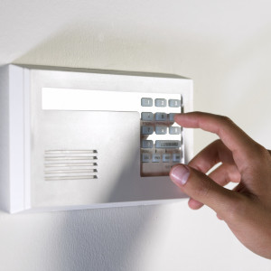 disarming alarm system --- Image by © Royalty-Free/Corbis